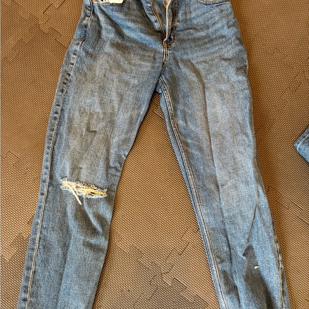 Distressed Blue Denim Jeans